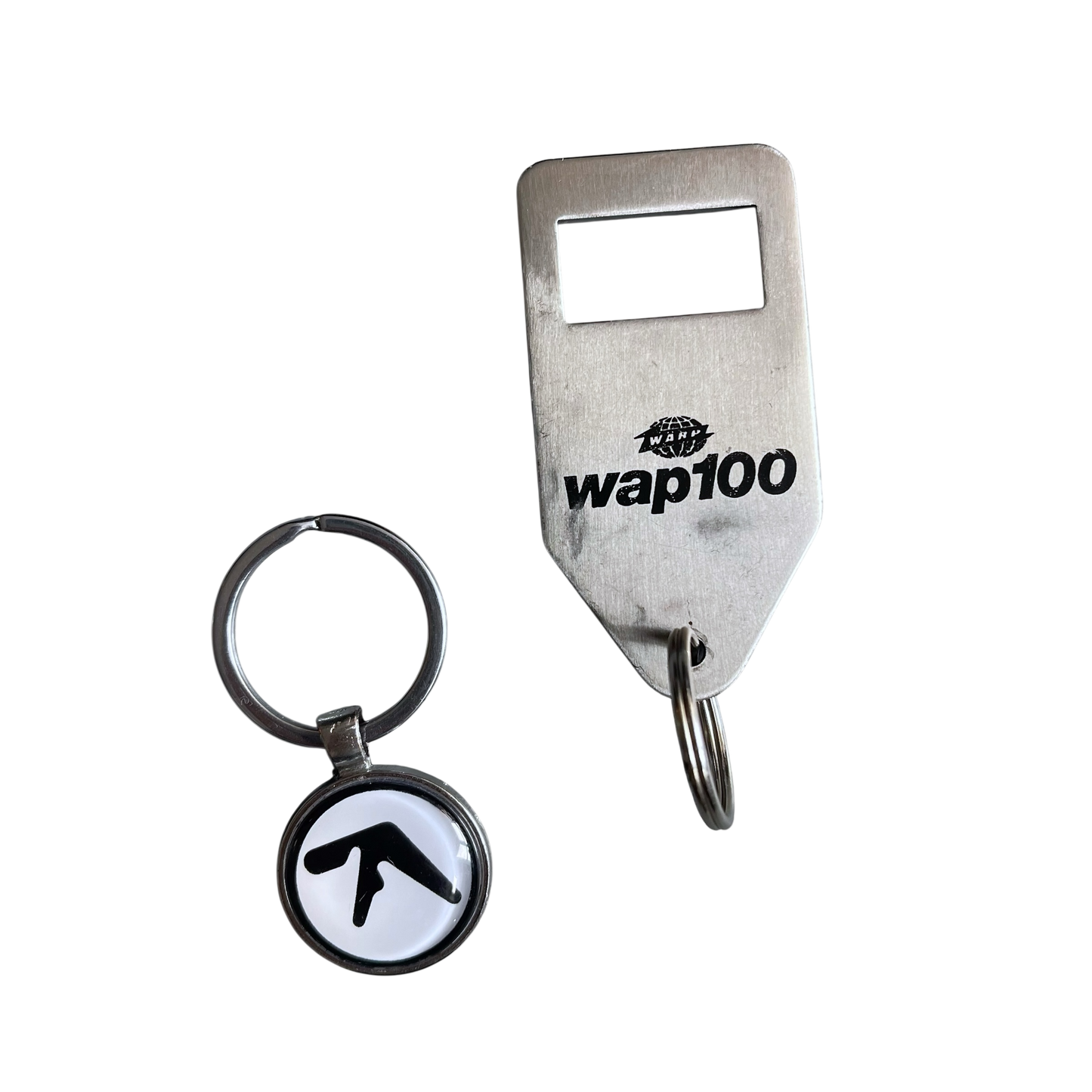Early 2000s Warp Records bottle opener / key ring