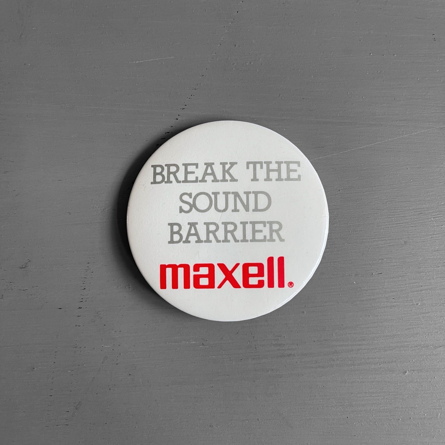 1980s MAXELL break the sound barrier pin badge