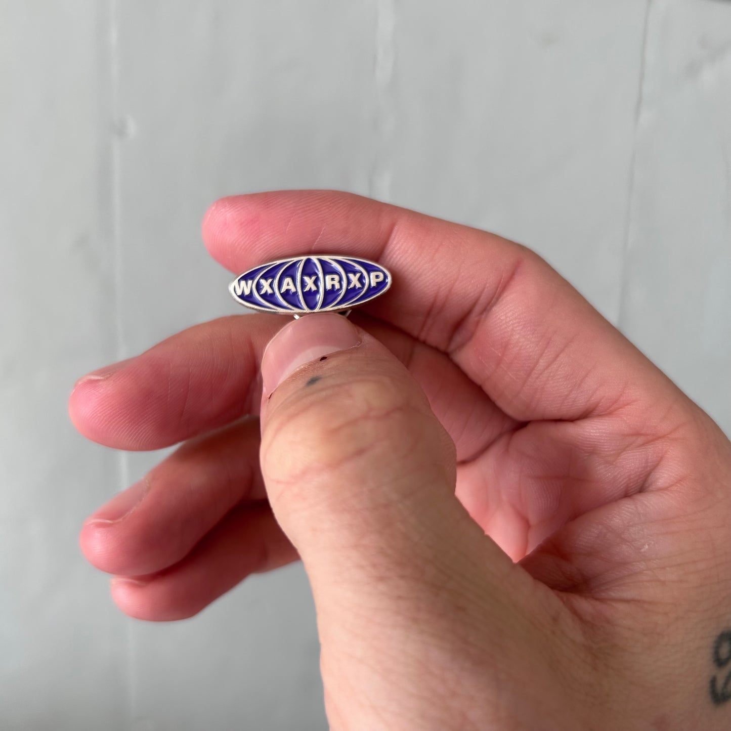 Warp Records 30th anniversary pin badge
