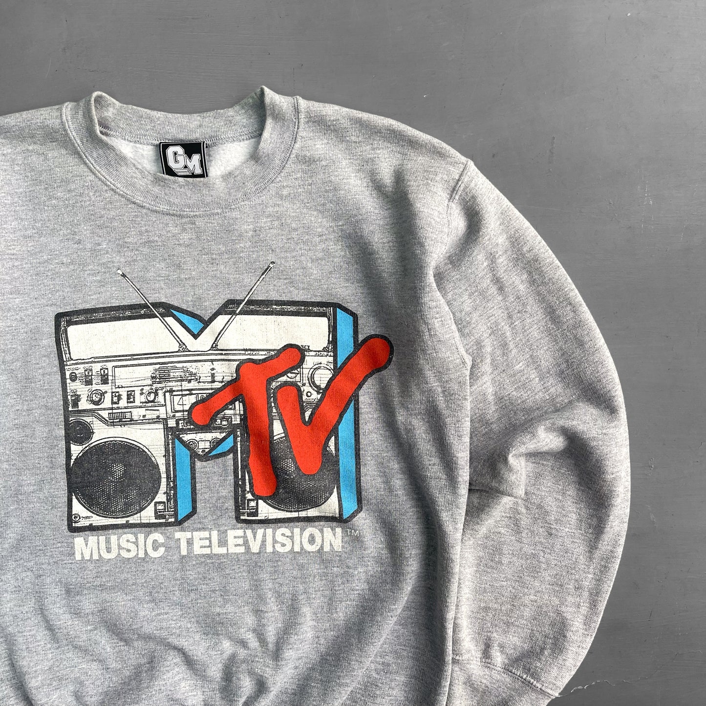 2000s MTV stereo jumper (M)