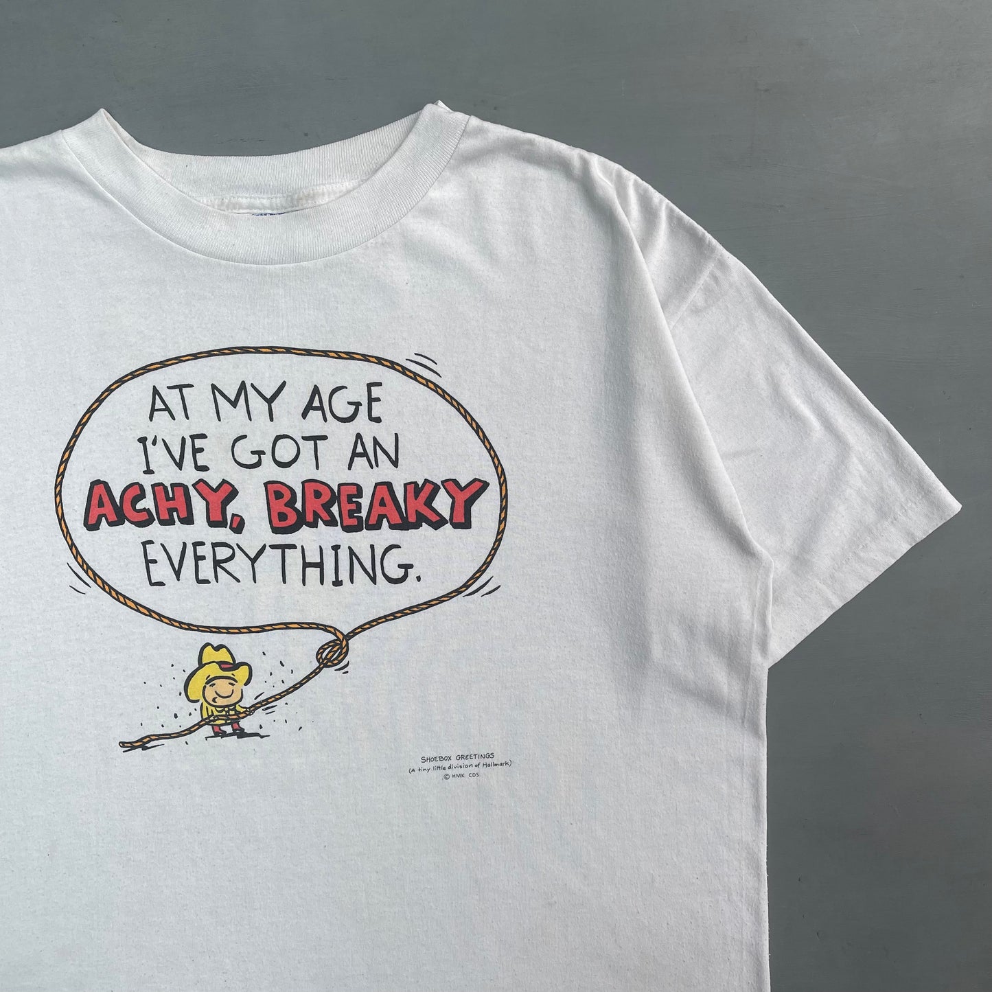 1990s at my I’ve I’ve got an achy breaky everything slogan T-shirt (XL)